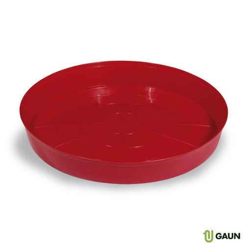 Red plastic chick tray feeder with a circular design.